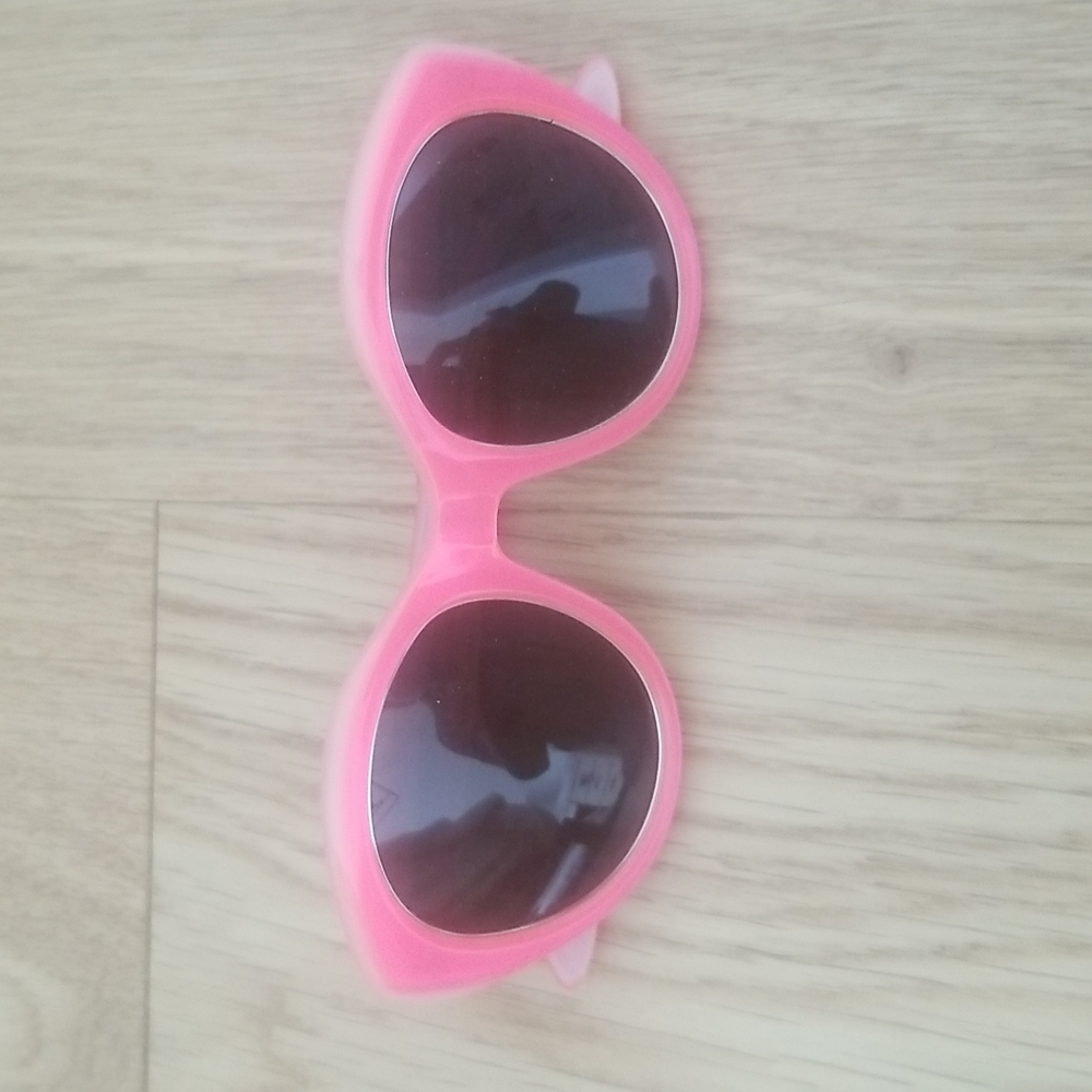 Rebecca Minkoff bright pink womans sunglasses new without original case.